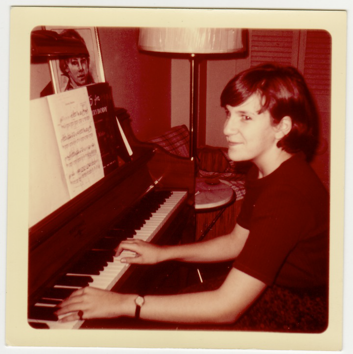 Young woman at a piano